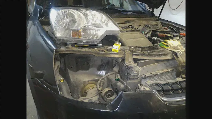 Замена ламп ближнего света Opel Antara 2012.